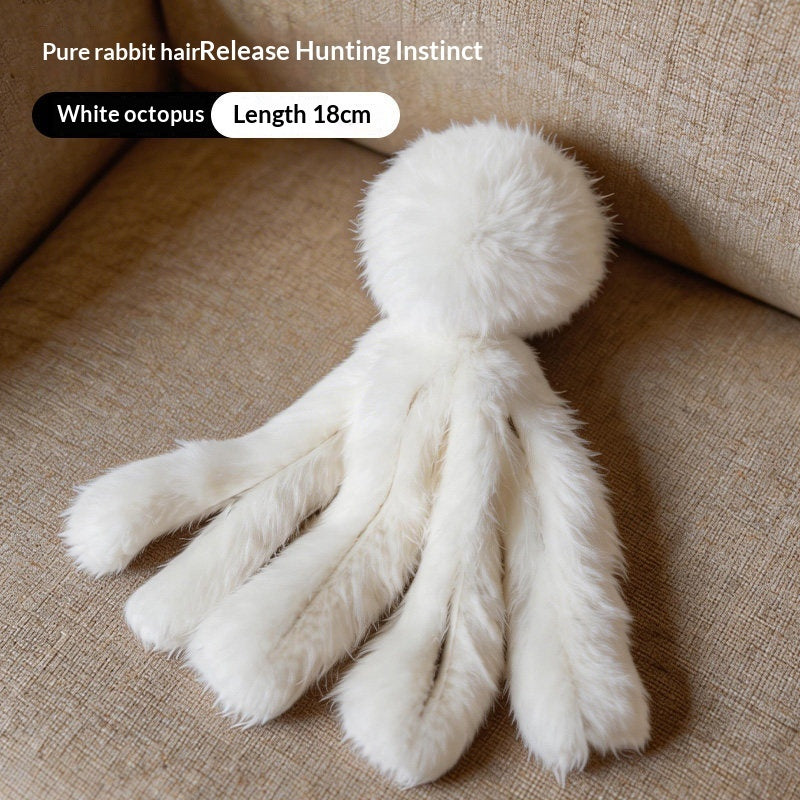 White octopus cat toy on a plain background